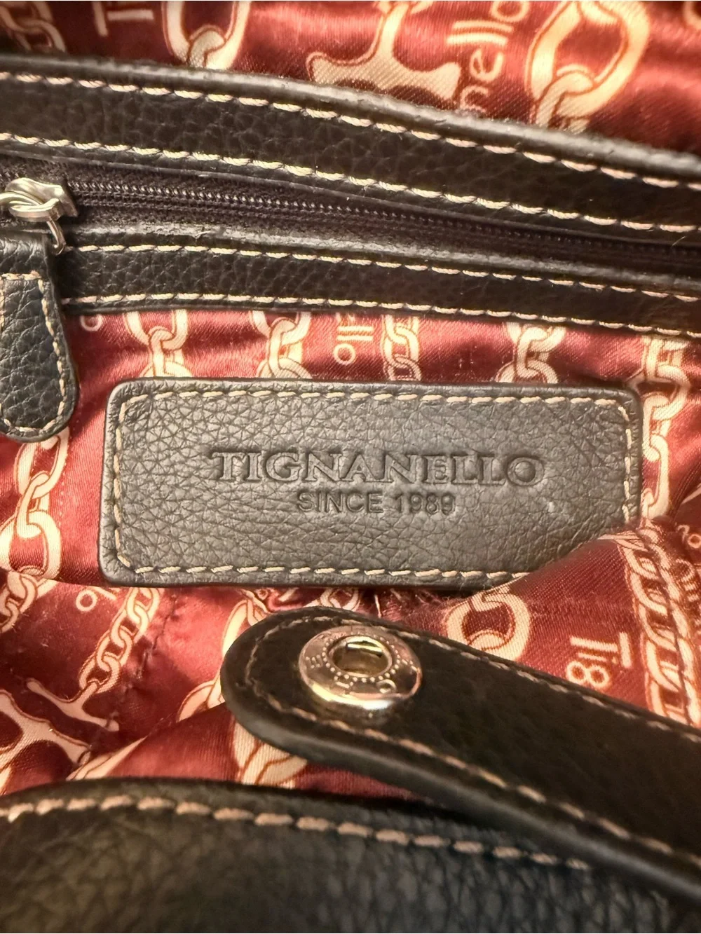 Tignanello Black Pebbled Leather Shoulder Bag with Buckle Straps